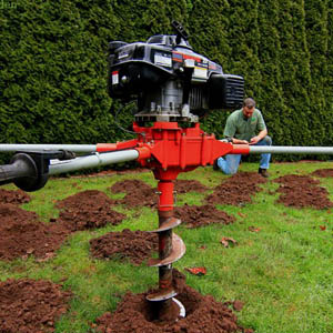 improving landscape drainage using auger for Medford soil
