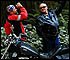 Men on motorcycle vacation looking at redwoods